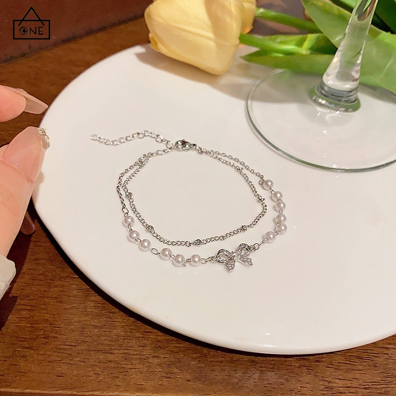 COD❤️สร้อยข้อมือสองชั้นมุกโบว์หรูหราสไตล์เกาหลีแฟชั่นละเอียดอ่อนเครื่องประดับสำหรับผู้หญิง-a.one