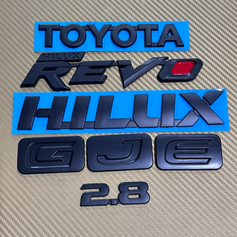 โลโก้ติดรถ Toyota Hilux REVO สีดำ ราคาต่อชิ้น