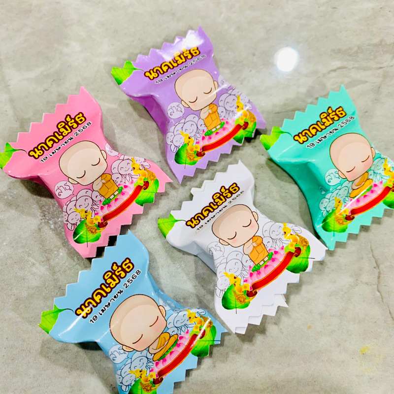 กระดาษโปรยทานงานบวชใส่ชื่อ ลายเณรน้อยคละสี
