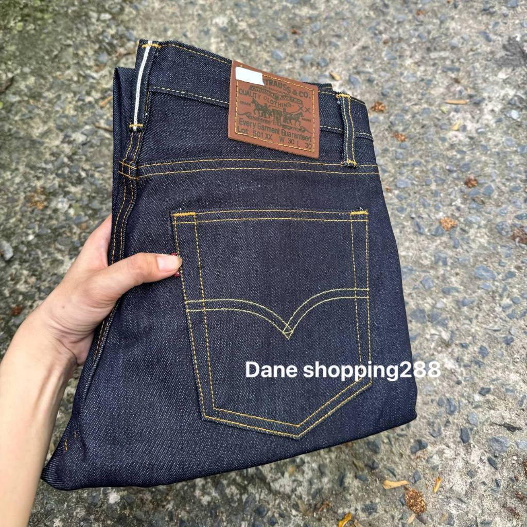 กางเกงยีนส์ผู้ชาย ป้ายสีส้ม ป้ายหนังผ้าดิบ ริมแดง  ขากระบอกเป็นกระดุม เอา29——42 ของจัดส่งทุกวัน