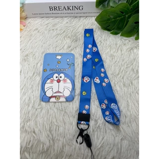 กระเป๋าใส่นามบัตร บัตรประจําตัวประชาชน พิมพ์ลายโดราเอมอน แบบสายคล้องคอ พับเก็บได้ สําหรับนักเรียน