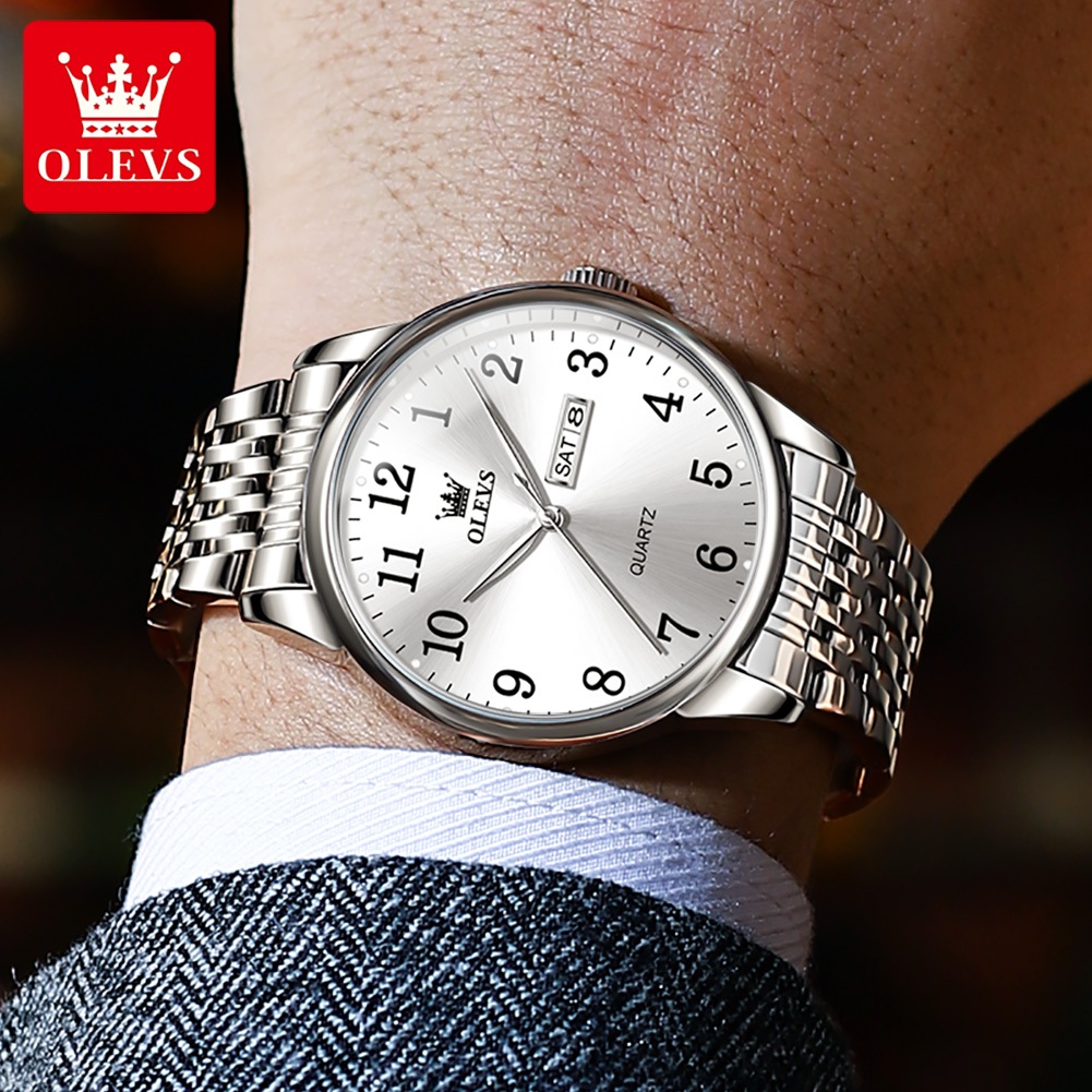 OLEVS นาฬิกาผู้ชาย กันน้ำ100% แท้ ธุรกิจ ปฏิทิน ดูวันที่ เรืองแสง สายสเตนเลส นาฬิกาข้อมือควอตซ์ 5535