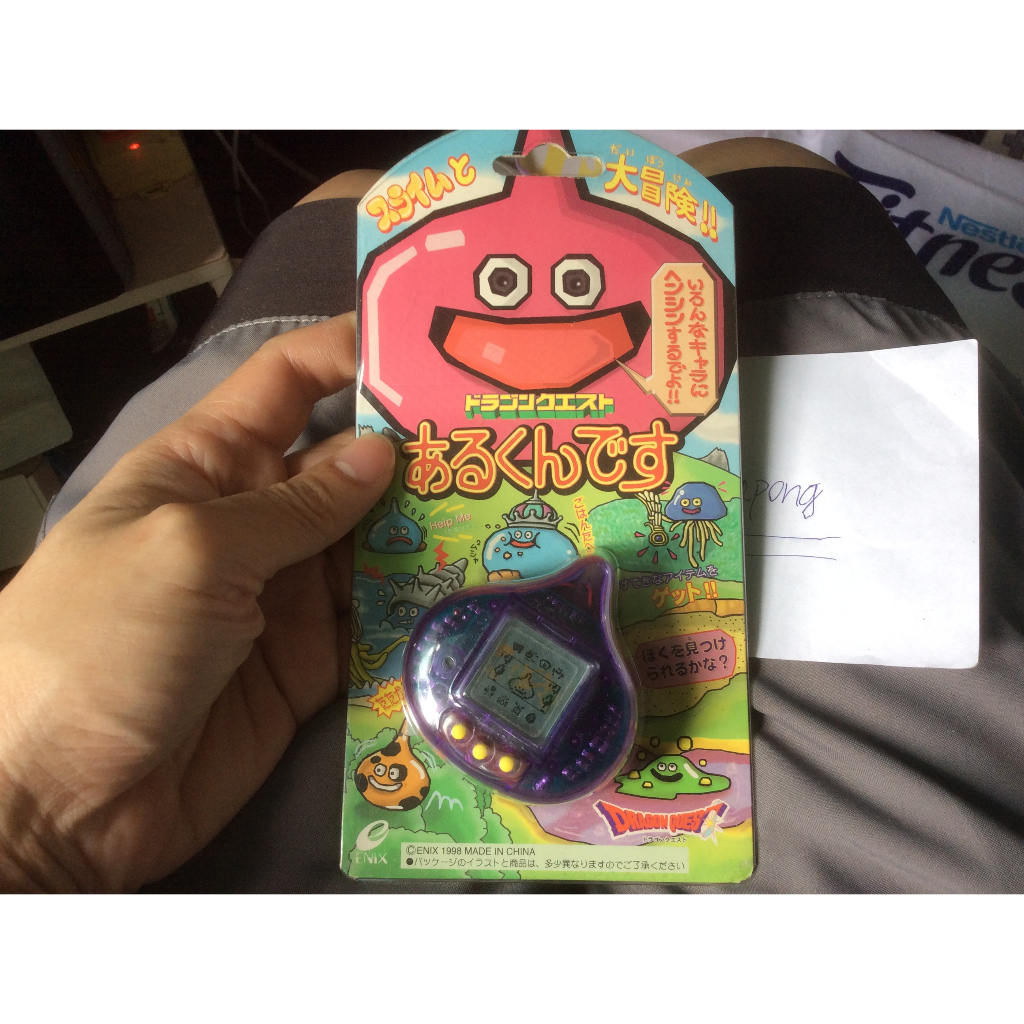 Tamagotchi Dragon Quest Arukundesu Slime virtual pet (1998)