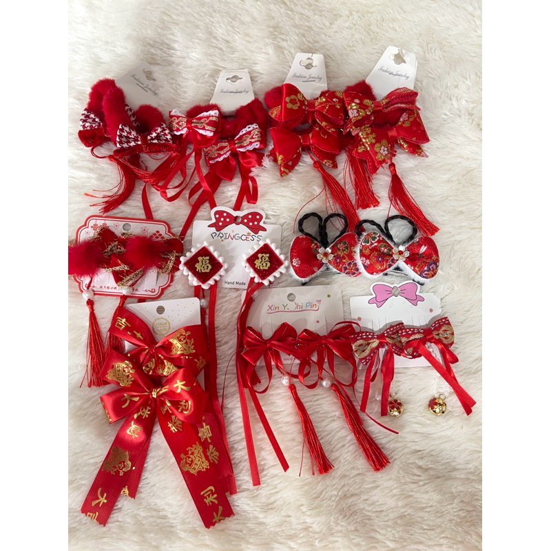 สินค้าพร้อมส่ง ของใหม่ รวมงานกิ้ฟและยางรัดผมตรุษจีน ได้2ชิ้น สวยทุกแบบเลยค่า