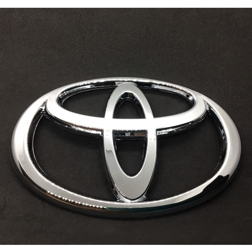 LOGO TOYOTA โลโก้ติดฝากระโปรงท้ายโตโยต้า LOGO TOYOTA ALTIS ปี2003 ขนาด10x7cm. สินค้ามีรับประกัน