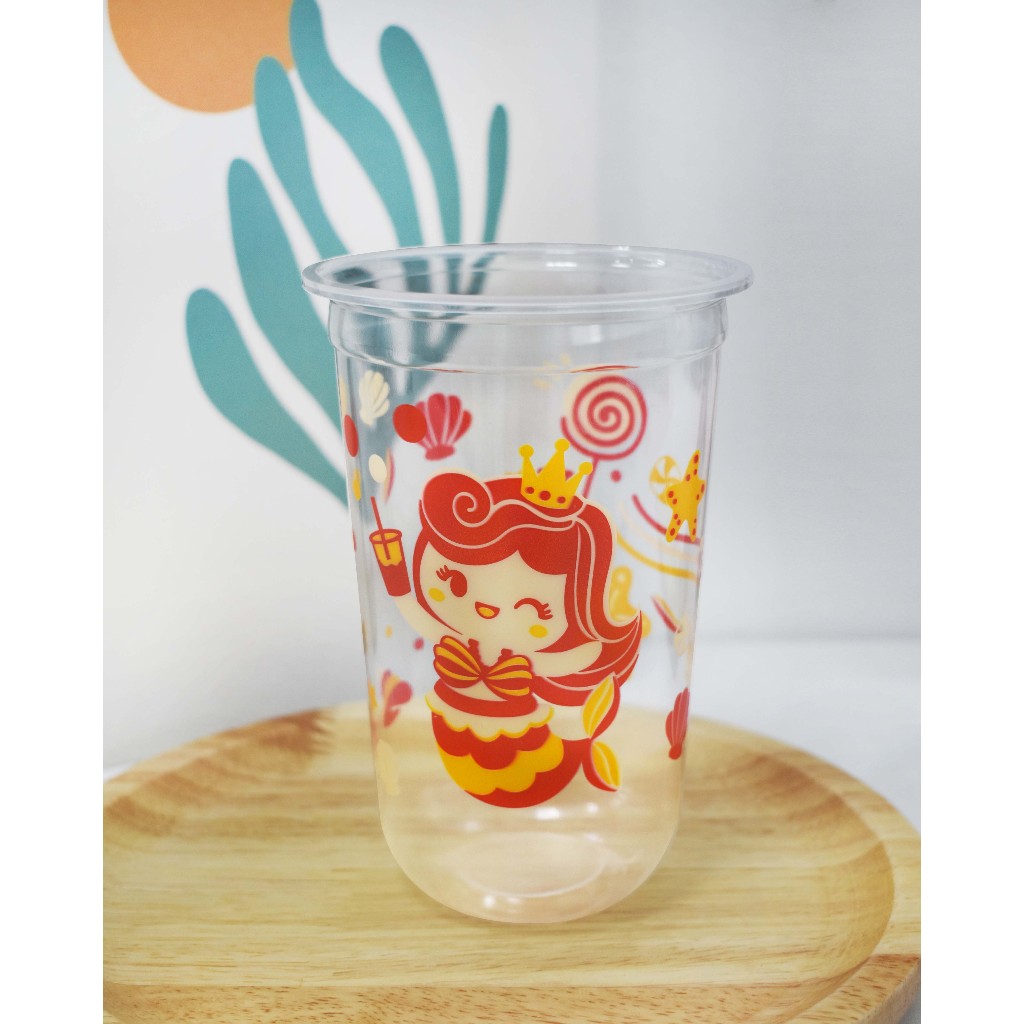 แก้วพิมพ์ลายทรงแคปซูล ตราโฮมคัพ ฝาปิด95 ขนาด22ออนซ์ ยกลัง1000ใบ(50ใบ x 20แถว) **HC-Q22เมอเมดแดง**