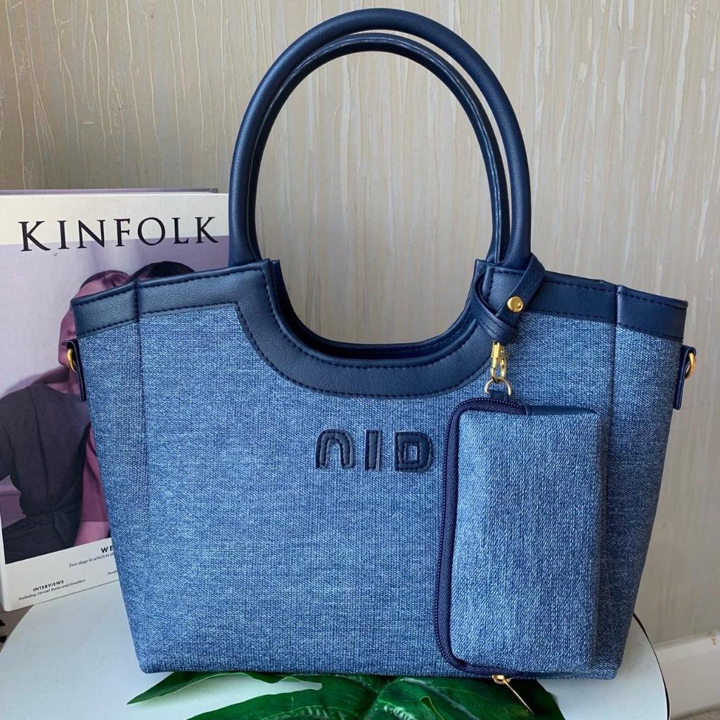 99 กระเป๋า NIDORA ทรงใบใหญ่ ไปพร้อมกระเป๋าตังค์ กว้าง 14 นิ้วสูง 9 นิ้ว ใส่ของได้เยอะ