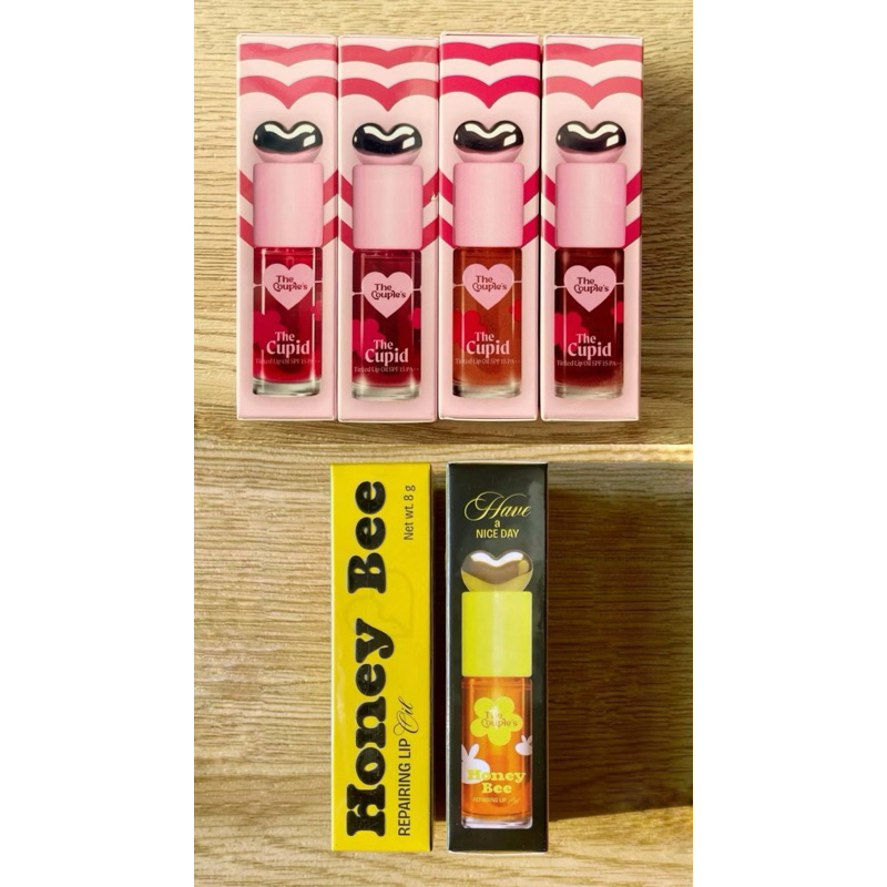 [มี Video =175บาท] The Couple's Cupid Tinted Lip Oil SPF 15 PA++ 8g / Honey Bee Repairing Lip Oil ลิปคุณโลมา
