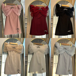 Nida dress เดรสปาดไหล่ซีทรู แต่งเข็มกัดโบว์วิ้งๆ