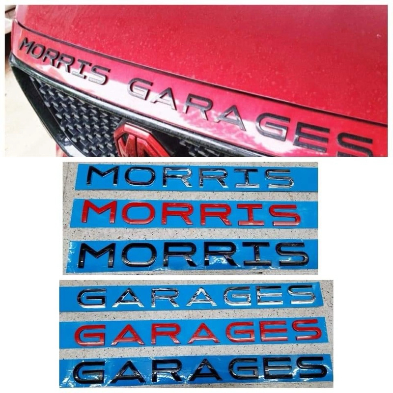 โลโก้  Morris garages สำหรับติดฝากระโปรง
