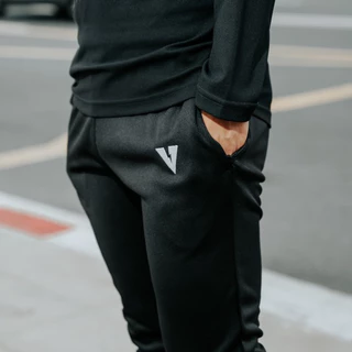 VOLT กางเกงขายาวผู้ชาย รุ่น NEUTRON 001 ESSENTIALS สีดำ ผ้ายืด ระบายอากาศ สำหรับเทรนนิ่งและออกกำลังกาย