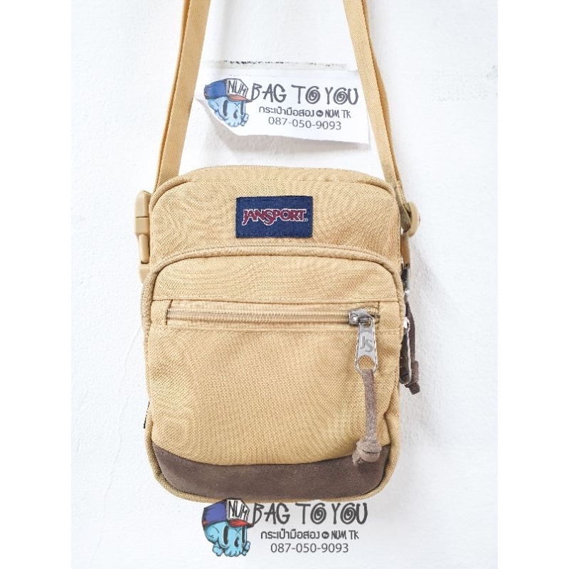 กระเป๋าสะพายข้างมือสอง Jansport สีครีม  สภาพใหม่