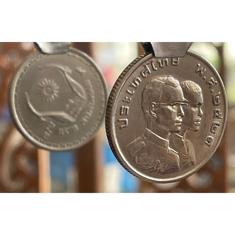 เหรียญ๑บาทกีฬาเอเช่นเกมส์ครั้งที่๘ปี๒๕๒๑ พระเศรียรเอียงผ่านการใช้งาน(E1-2521-0029)