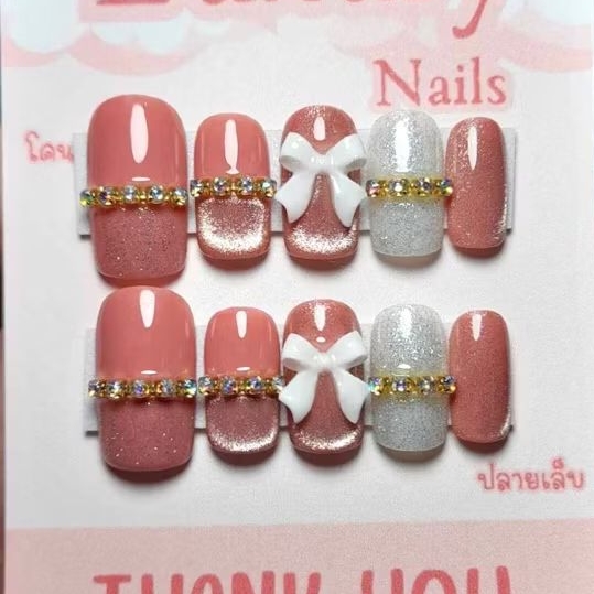 เล็บเจลแท้ 100% แถมฟรีกาวตะไบ ซื้อครบ 3 ชุดขึ้นแถมฟรีกาว 401 ทรงยาวกลางสีชมพู+ลูกแก้ว อะไหล่โบว์หางสีขาว
