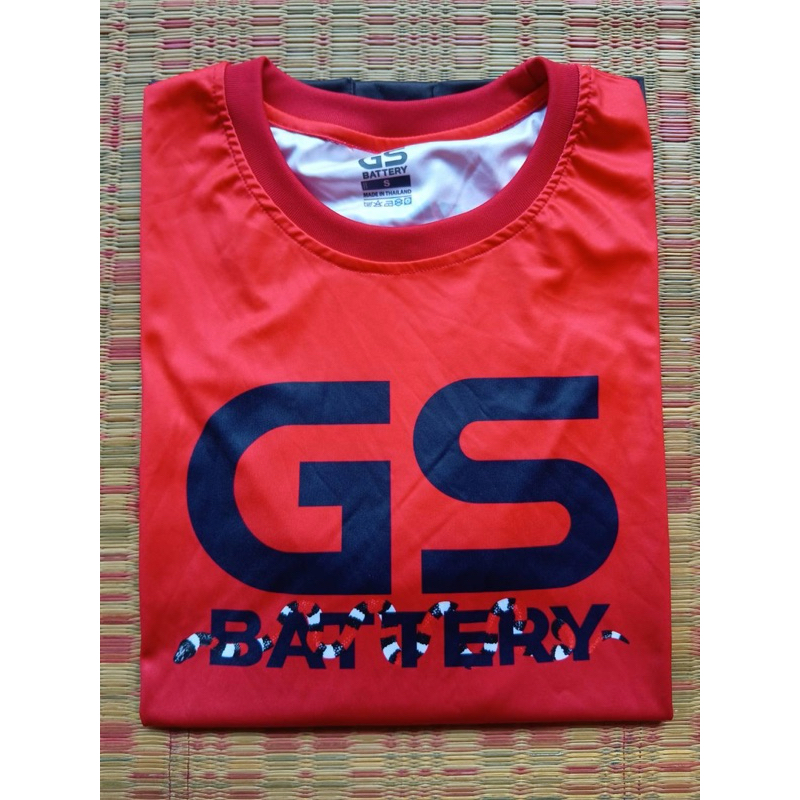 เสื้อยืดสีส้ม GS Battery