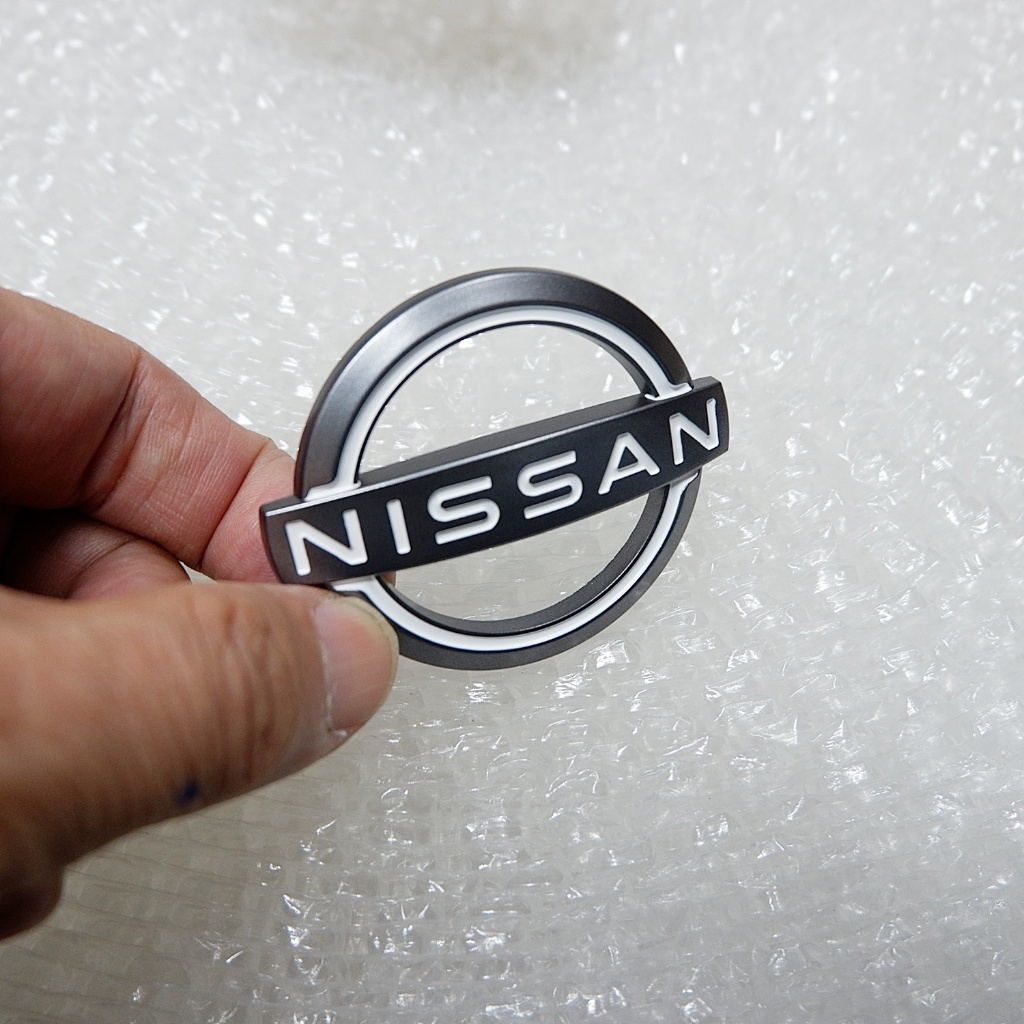 NA-01/02โลโก้ติดพวงมาลัยNissan ใหม่สีเงินขนาด5.5X4.8และ6.0X5.0cmcmมีเทปกาวสองหน้าด้านหลัง - รูปที่ 4