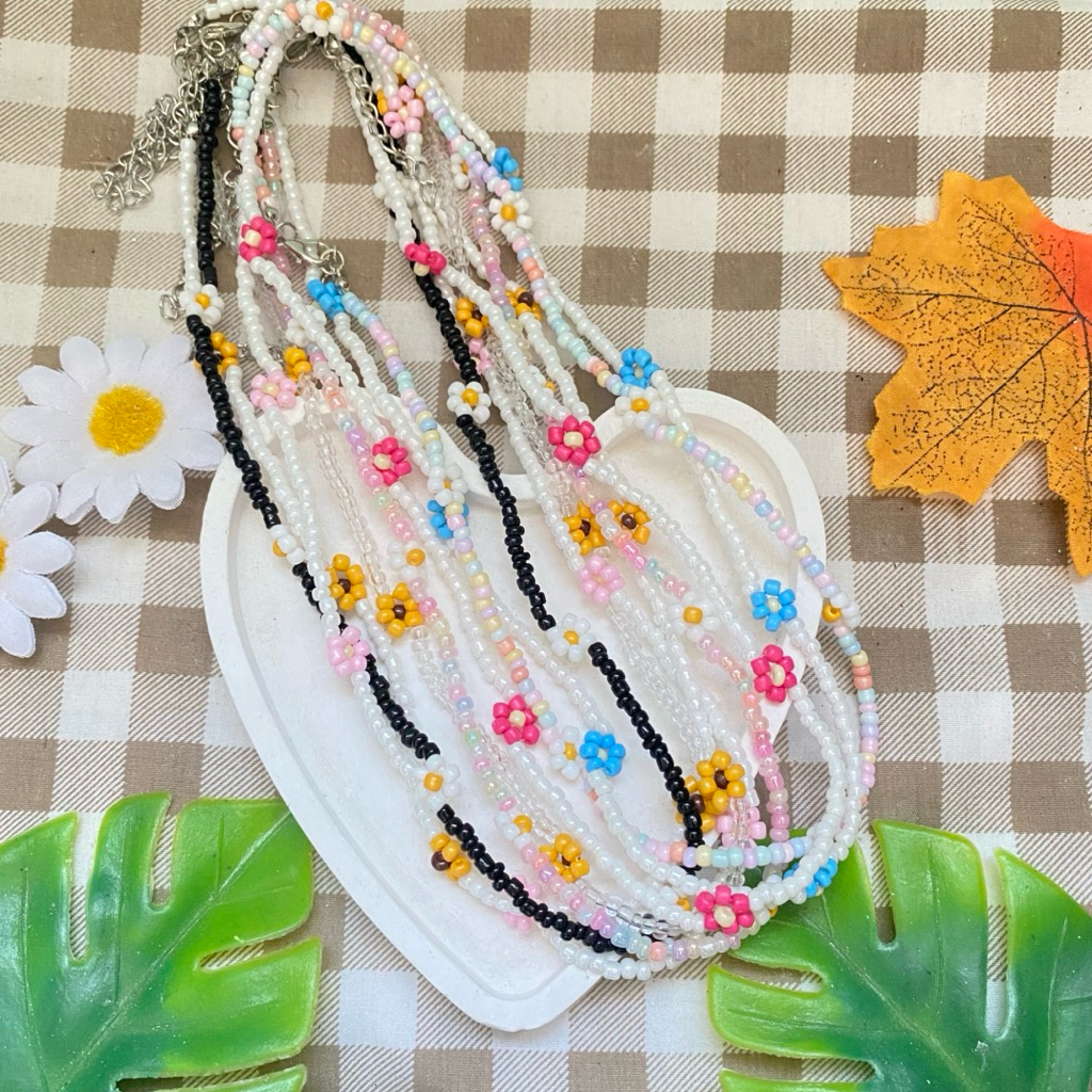 พร้อมส่ง   สร้อยคอ สร้อยข้อมือลูกปัดจี้ดอกไม้ – โปรปัง