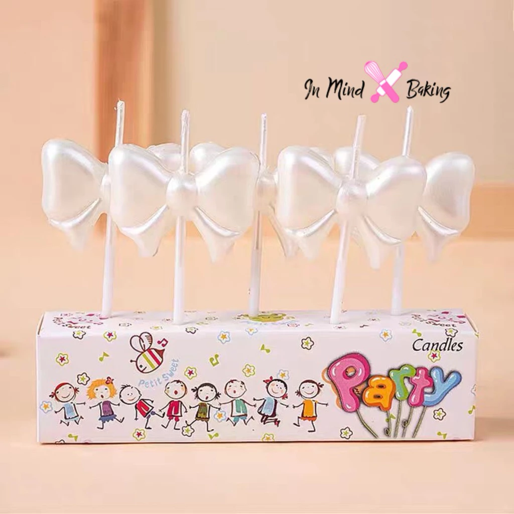 เทียนวันเกิดรูปโบว์ (แพค5ชิ้น)(สีชมพู)