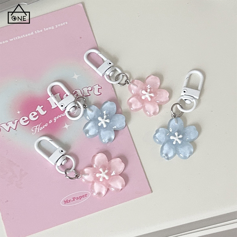 COD❤️พวงกุญแจรูปดอกซากุระเยลลี่ส์ใสน่ารักนักเรียนประดับสําหรับกระเป๋านักเรียนคู่รักเพื่อนของขวัญ-a.one