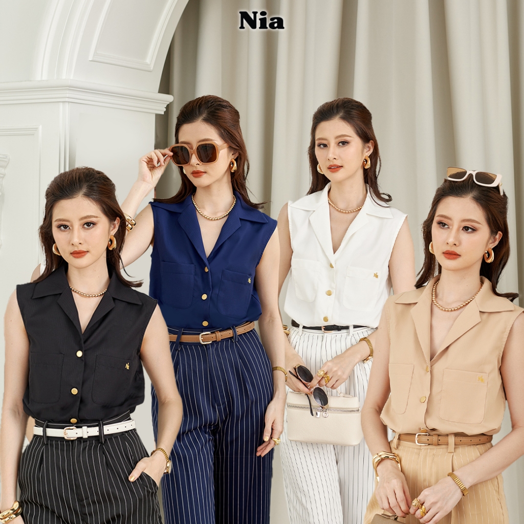 Nia-Audrey Sleeveless Shirt เสื้อเชิ้ตแขนกุดทรงตรง ปกคอสูท ผ้าทอคล้ายฝ้ายยับยาก ปักโลโก้ Nia แต่งกระดุมทองในสไตล์Old Mon
