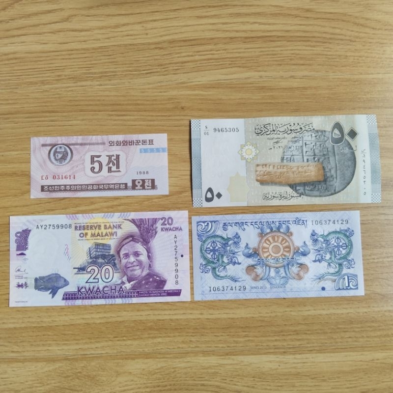 ชุดธนบัตร 4 ใบ เกาหลี,มาลาวี,ซีเรียและภูฏาน ไม่ผ่านใช้