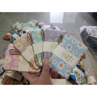 กระเป๋ามีสายคล้องลายเดซี่