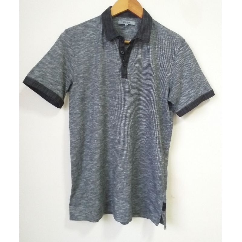 เสื้อโปโลแขนสั้นผู้ชาย-หญิง ผ้ายืด g 2 000 มือ2 สภาพดี มีตำหนิรอยขาดตามรูป (g25)