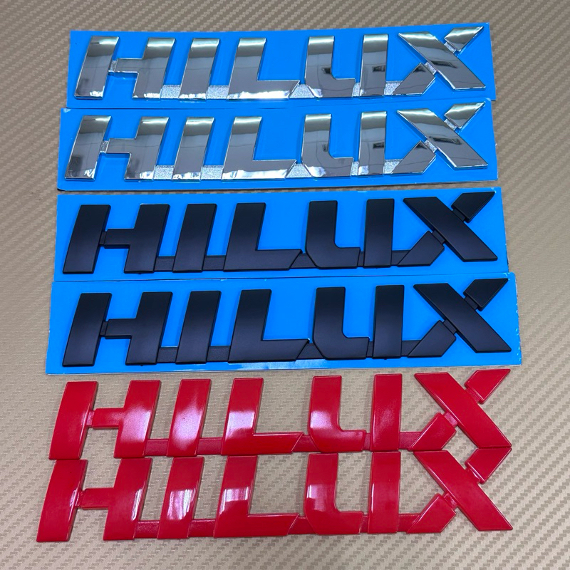 โลโก้* Hilux  ติดข้างประตู toyota Revo มีสามสีให้เลือก ( ชุด 2 ชิ้น )