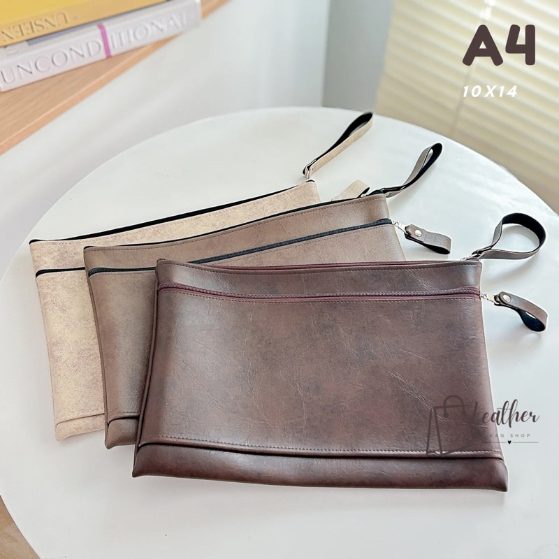 กระเป๋าหนัง ใส่เอกสาร รุ่น2ซิป มีซับในบุกำมะหยี่ หนังเป็นทรง กันน้ำได้ ขนาดA4 (10×14)