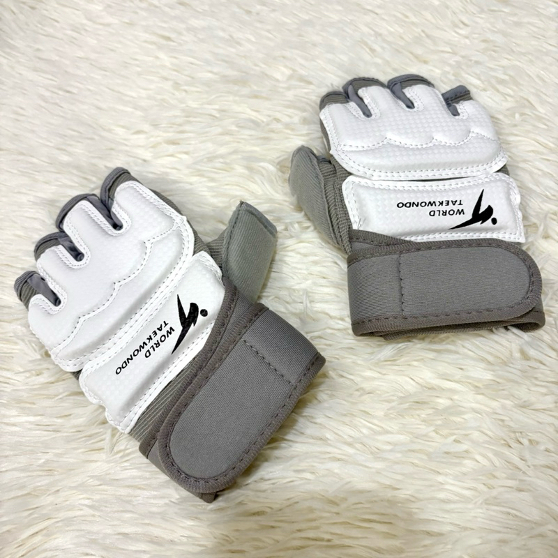 🔥ของแท้100%👍 WTF  นวม MMA ถุงมือเทควันโดฟิตเนส นวมแบบเปิดนิ้วชกมวย Taekwondo Hand Gloves