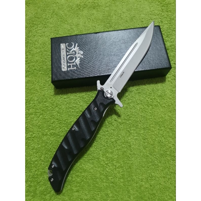 Premium folding knife, HOKC model, D2 blade, ball bearing system. Opens the knife blade smoothly. Go