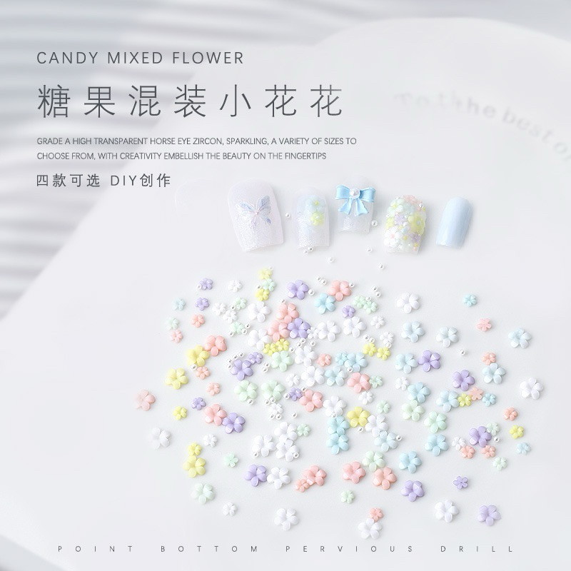 อะไหล่ติดเล็บ ลวดลายดอกไม้คละขนาดคละลาย เพิ่มกิมมิคด้วยหมุดสีต่างๆ 100 ชิ้น/ห่อ สินค้าพร้อมส่ง