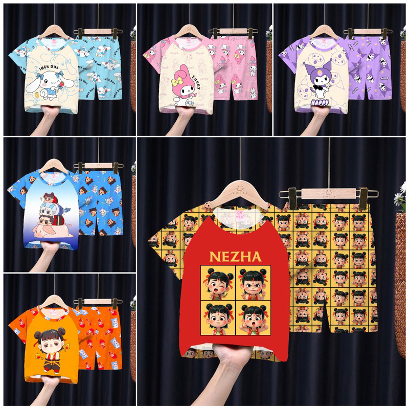 ชุดนอนเด็กสไตล์ใหม่ฤดูร้อนแขนสั้นกลางเด็กใหญ่ชายเสื้อผ้าที่บ้านสาวน้อยชุดการ์ตูน