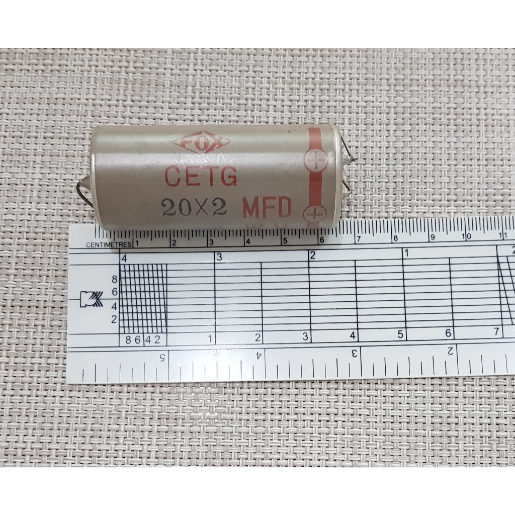 Capacitor Fox คาปาซิเตอร์ชนิดอีเล็คโทไลท์ แบบหางหนู มี 2 ค่าในตัว 20 + 20 uf/ 450v. ขนาด 2.5 x 6.5 cm.