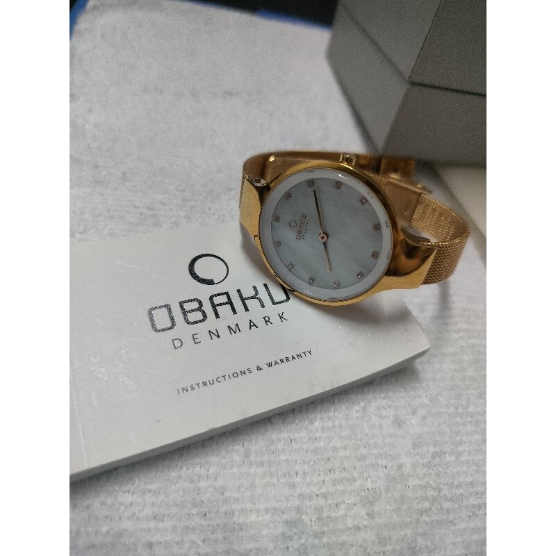 นาฬิกาข้อมือสีทอง ยี่ห้อ obaku (มือสองสภาพดี)