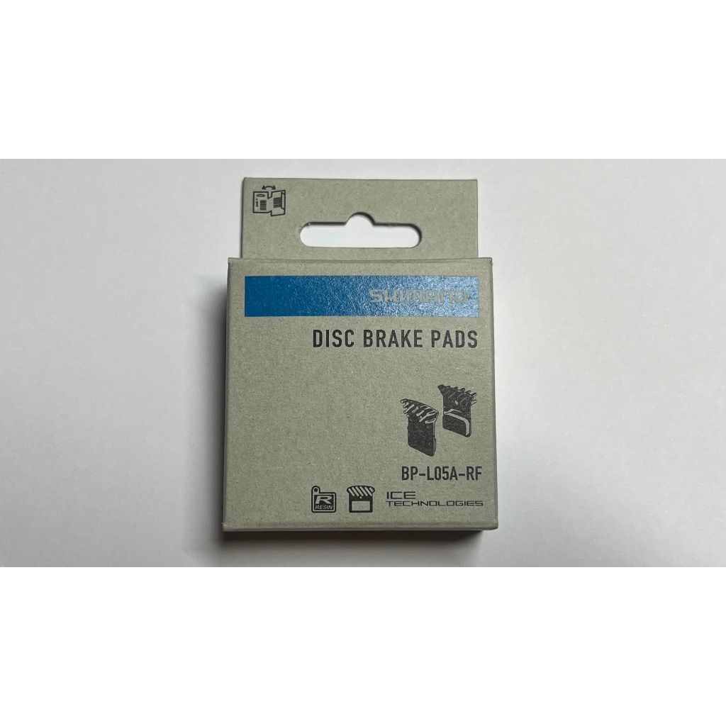 ผ้าเบรคดิส เสือหมอบ Dura Ace  ,Ultegra SHIMANO DISC BRAKE PAD RESIN WITH FIN L05A-RF 1 PAIR