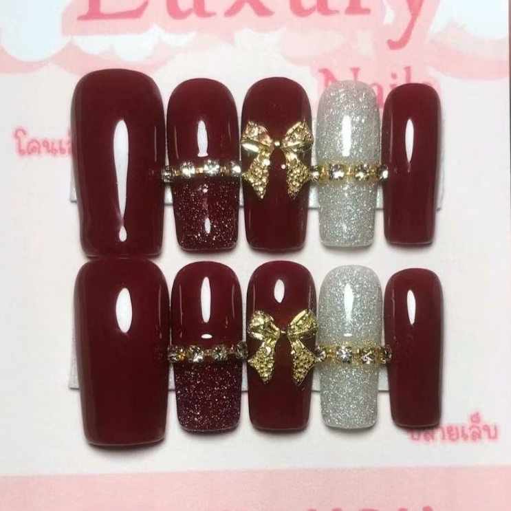 เล็บเจล 100% แถมฟรีกาวตะไบ ซื้อครบ 3ชุดแถมฟรีกาว 401 ทรงเหลี่ยมยาวสีแดงโบว์ทอง