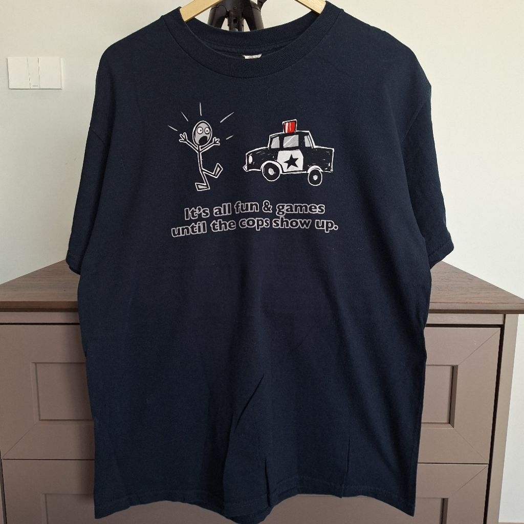 เสื้อยืด ลายปั่น it's all fun & games until the cops show up size L (AC99)