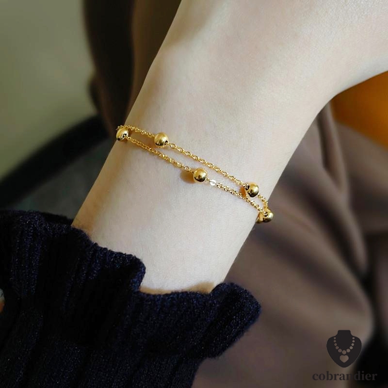 CODส่งเร็ว⚡สร้อยข้อมือเหล็กไทเทเนียมสเตนเลส ทอง18Kสองชั้น โซ่ลูกปัดกลม ปรับขนาด เครื่องประดับสำหรับผู้หญิง