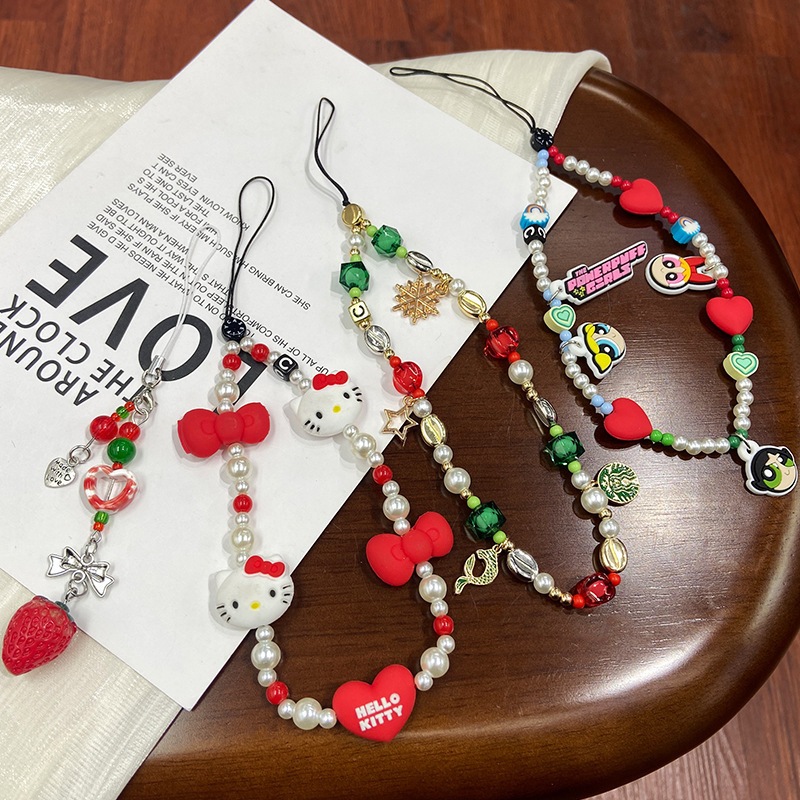 สายคล้องมือ สตอเบอร์รี่พวงกุญแจ โซ่โทรศัพท์ลูกปัดสวยงามลายการ์ตูน จี้กล้องน่ารัก ป้องกันการสูญหาย โซ่โทรศัพท์ สร้อยเชือก