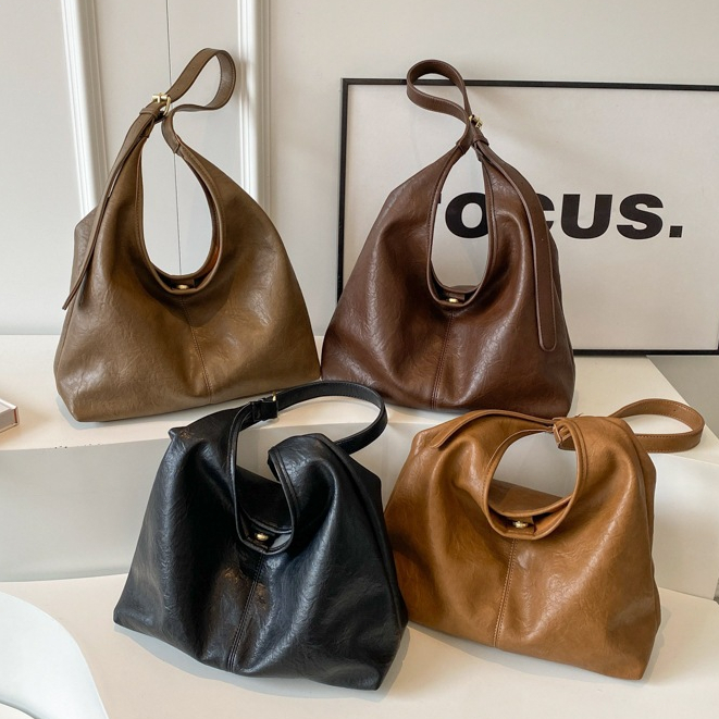 【พร้อมส่ง】Super bag กระเป๋าสไตล์เกาหลี กระเป๋าเดินทางแบบใหม่ เรียบง่ายและอเนกประสงค์ กระเป๋าสะพายไหล่หนังนิ่ม