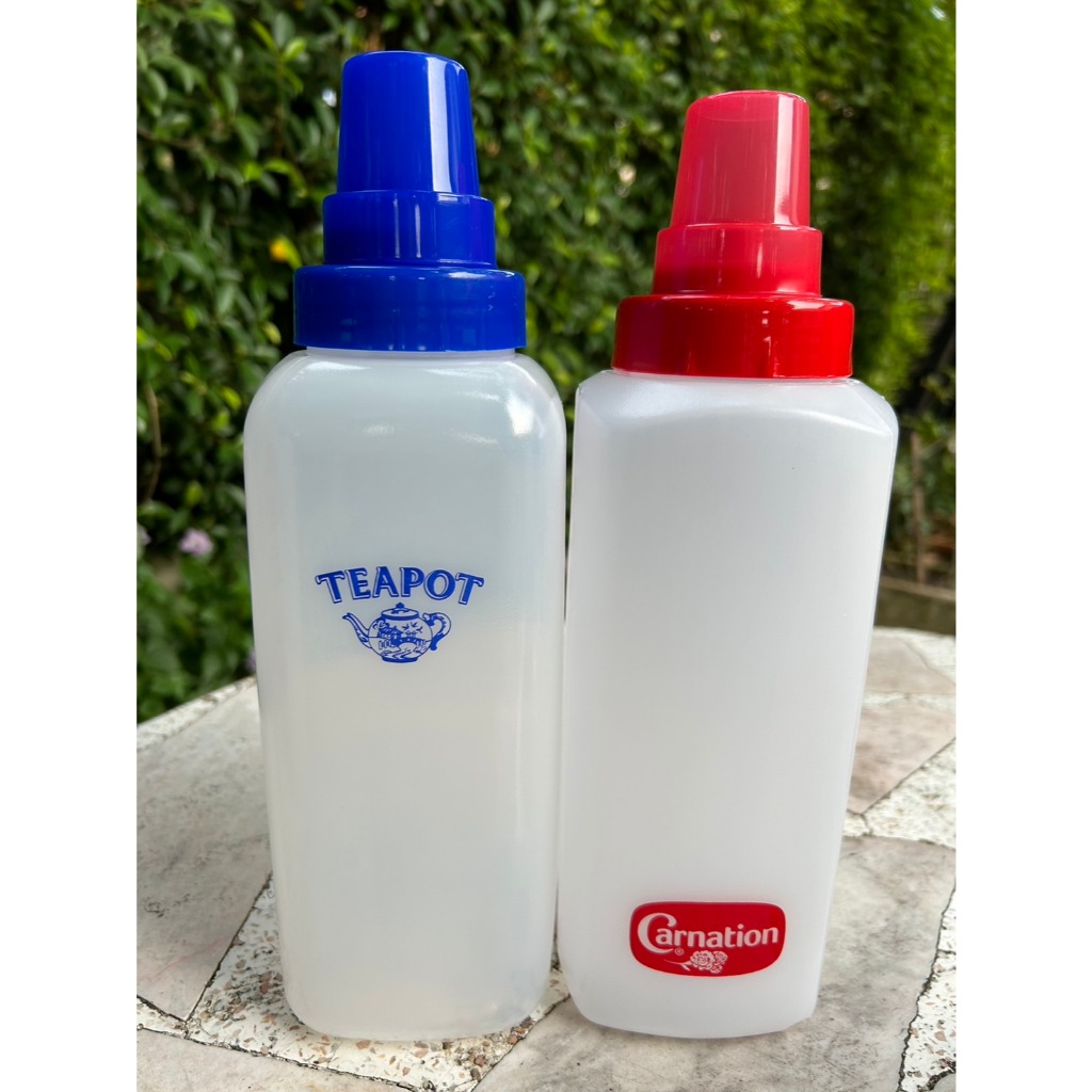 ขวดบีบซอส/นม 1200ml มีฝาครอบจุก พรีเมี้ยมคาร์เนชั่น ทีพอท