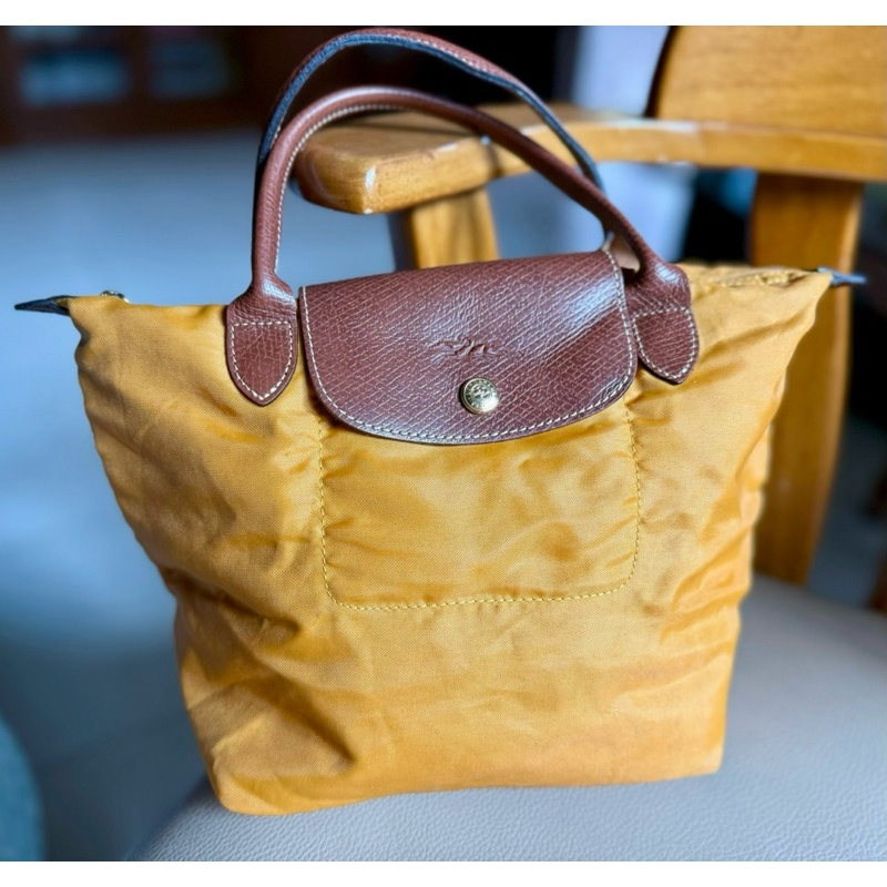 กระเป๋า longchamp มือสองของแท้ 100%  สภาพ 75% นะคะ ถ้าไม่ซีเรียสมาก ใช้ต่อได้สบายมากค่ะ