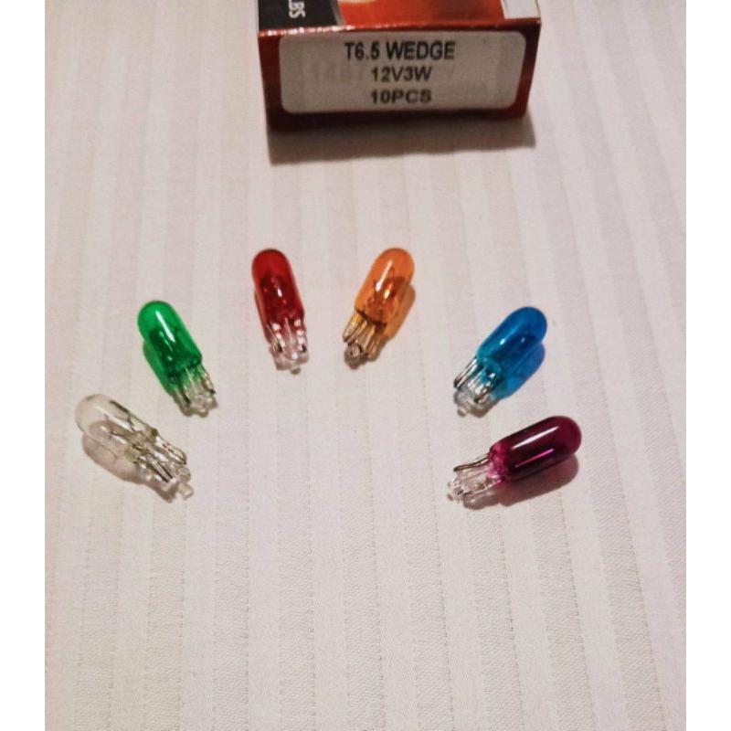 หลอดเสียบหน้าปัด T6.5 12V. 3W. มี 6 สี ให้เลือกใช้งาน ราคาต่อ 1กล่อง 10ดวง
