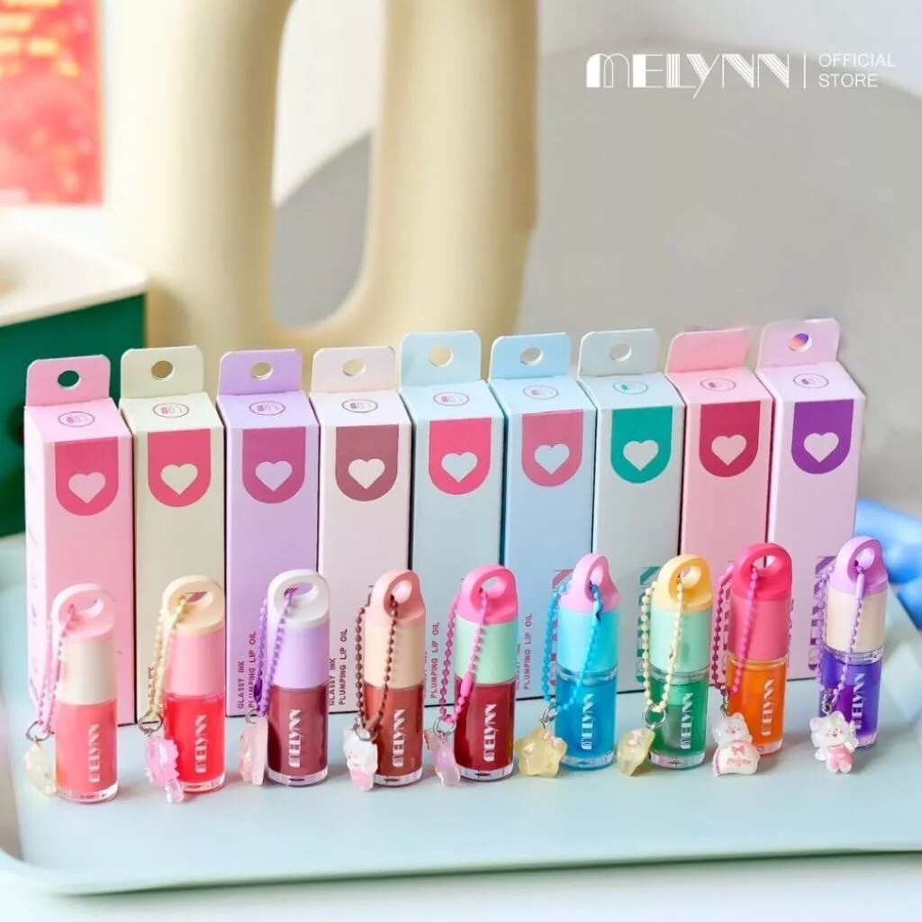 กลอสออย มีลีนณ์ กลาสซี่ อิ้งค์ พลัมพิง Melynn - Glassy Ink Plumping Lip Oil