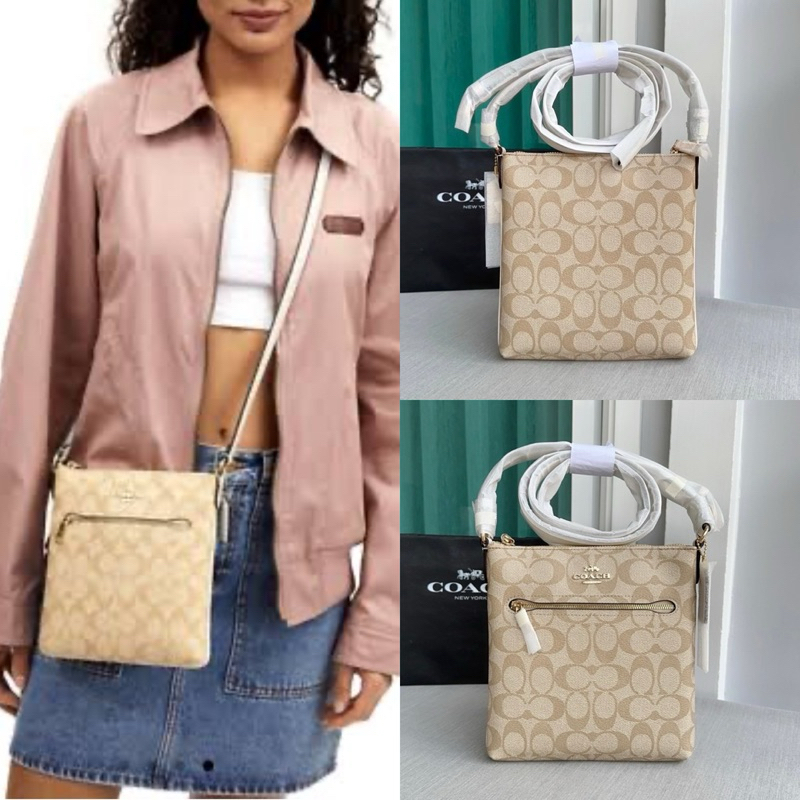 🎀(สด-ผ่อน) CS182 Mini Rowan File Bag In Signature Canvas