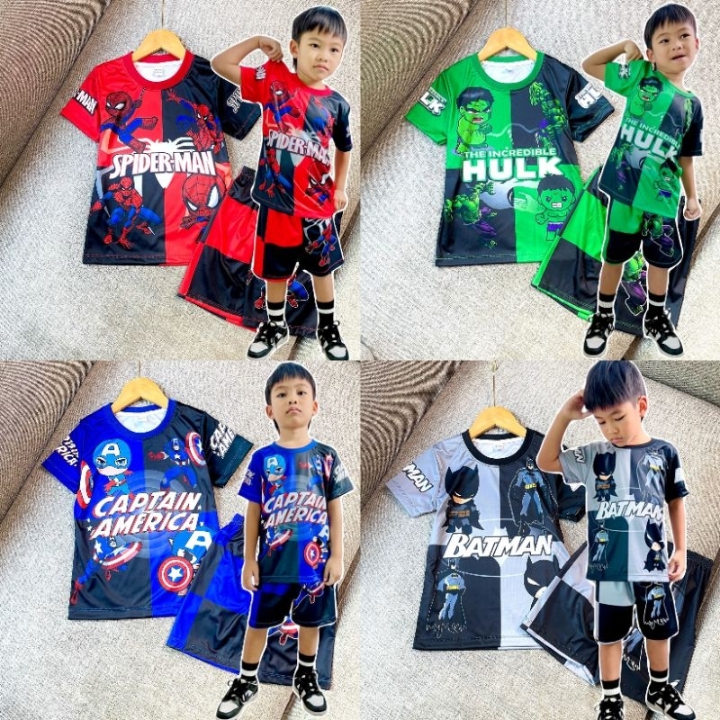 ชุดเด็กผู้ชายลายฮีโร่ เสื้อแขนสั้น กางเกงขาสั้น ผ้าไมโคร(ผ้ามัน) รุ่นตาราง
