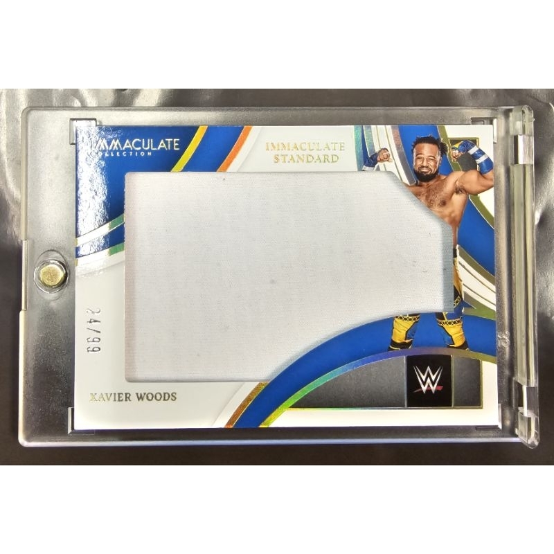 Panini:พานินี่-การ์ดชิ้นส่วนชุดมวยปล้ำ ของ Xavier Woods (WWE) run.24/99