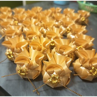 เหรียญโปรยทานถุงเงินถุงทอง(ตัวเปล่า)50 ลูกและ 100 ลูก