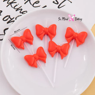 เทียนวันเกิดรูปโบว์ (แพค5ชิ้น)(สีชมพู)